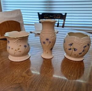 Lenox brand set of 3. Two tealight holders(with tealight) and one matching vase.